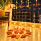 Jasmine Semi-Circle rangoli patterns with glowing diyas for a traditional Diwali setup