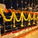 For a festive Diwali, decorate your balcony with a yellow tassel garland.