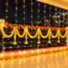 A Diwali Balcony Decoration including Marigold Garlands and Warm Fairy Lights.