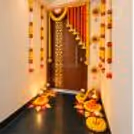 Diwali Entrance Decoration using Marigold Flower Toran & Traditional Mud Pot Decor