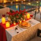 Rose-themed romantic dinner setup for anniversaries, birthdays, proposals, and special celebrations with CherishX.