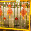 Artificial garlands and pan leaves maintain their vibrancy without wilting for long