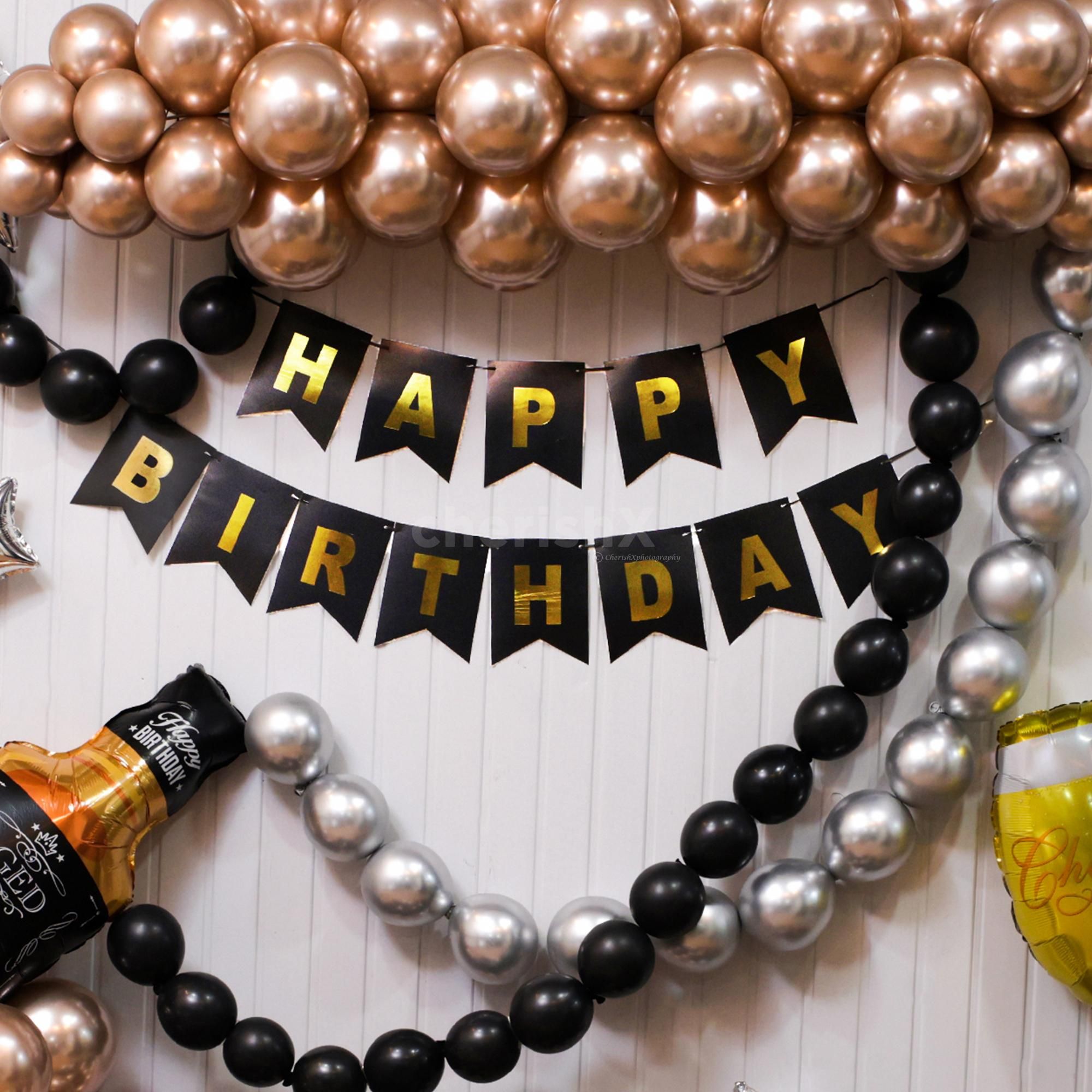 Wine glass and whiskey bottle foil balloons for fun of birthday celebration