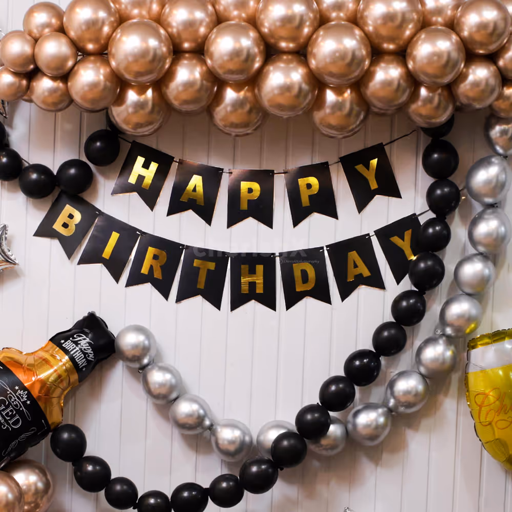 Wine glass and whiskey bottle foil balloons for fun of birthday celebration
