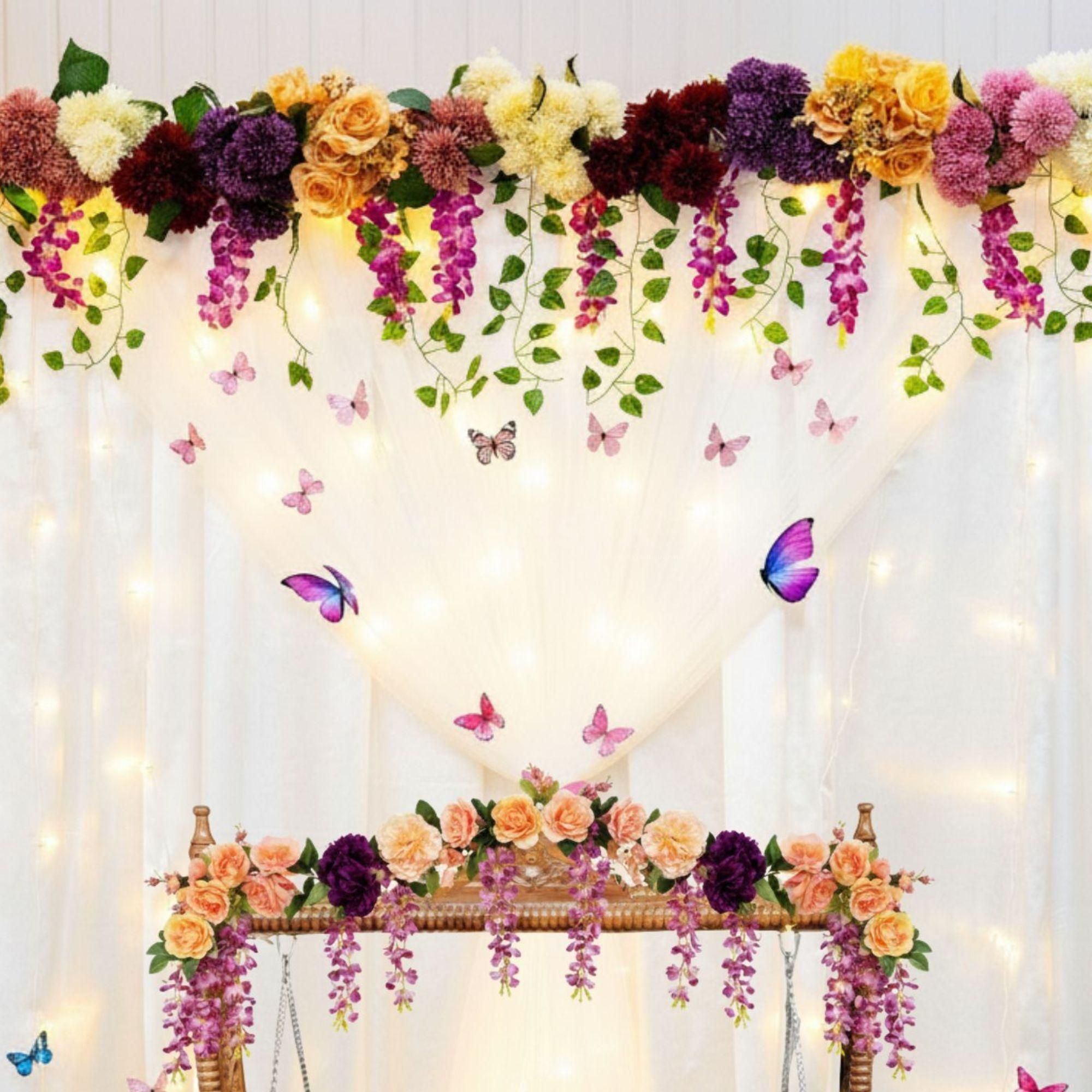Soft flowers, lights, and paper butterflies create magical effect for mesmerising cradle ceremony