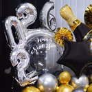 The black and silver balloons make it stand out