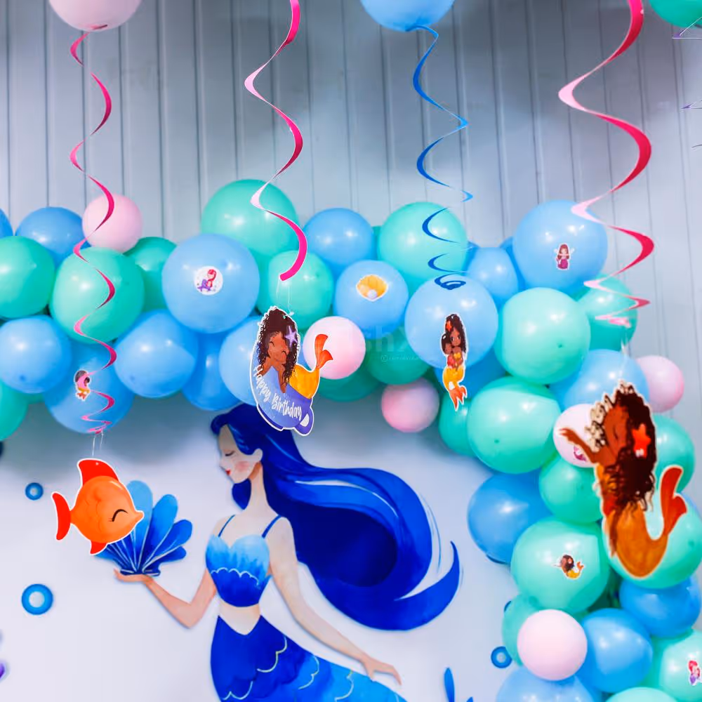 Cake's got glitter, fish got flair, the party got loud