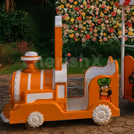Kids enjoy cheerful rides around the event area in complete safety