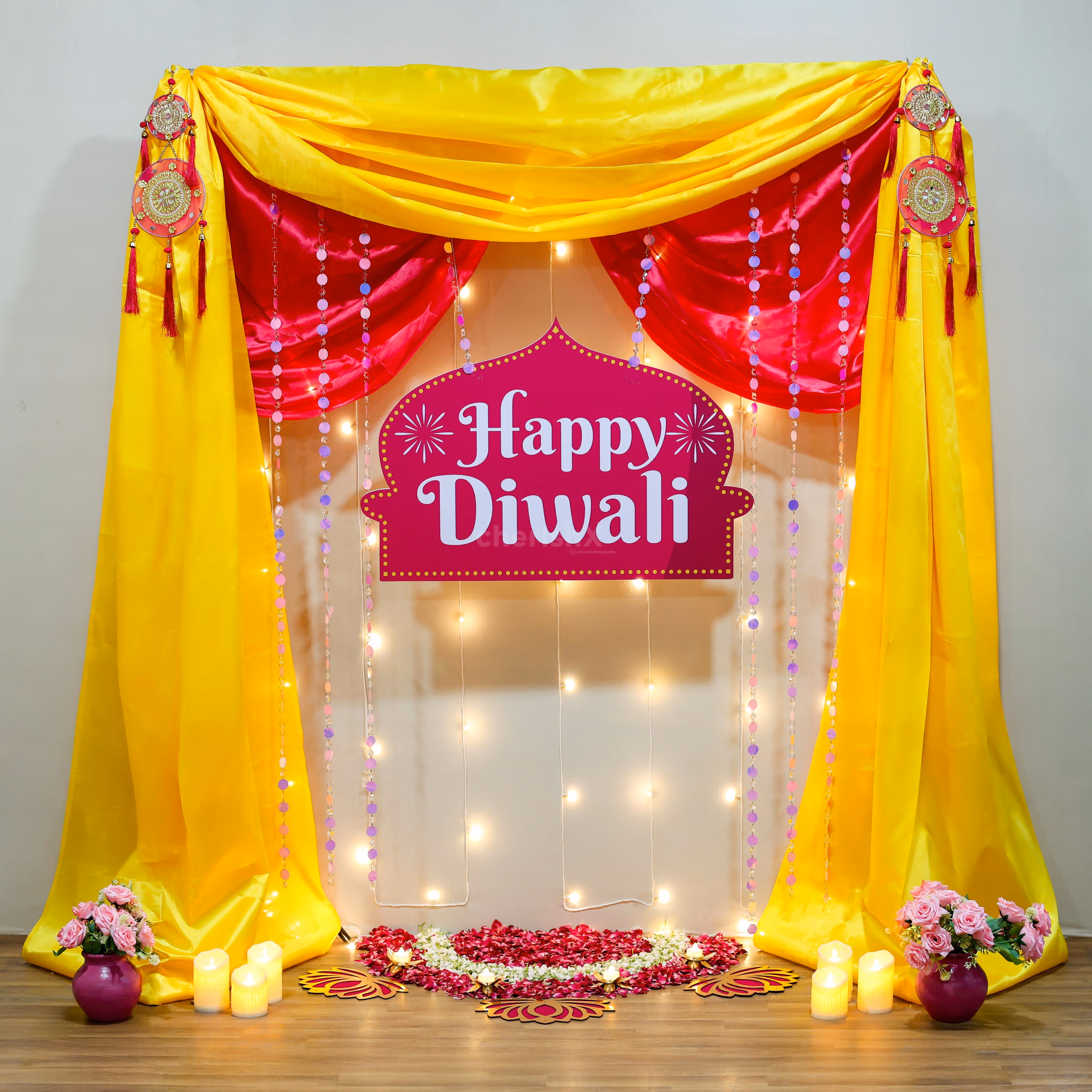 Two pink pots with flower bunches enhance the beauty and freshness of the office.