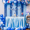 Shimmering foil stars and bunting enhance the frozen birthday bash decor