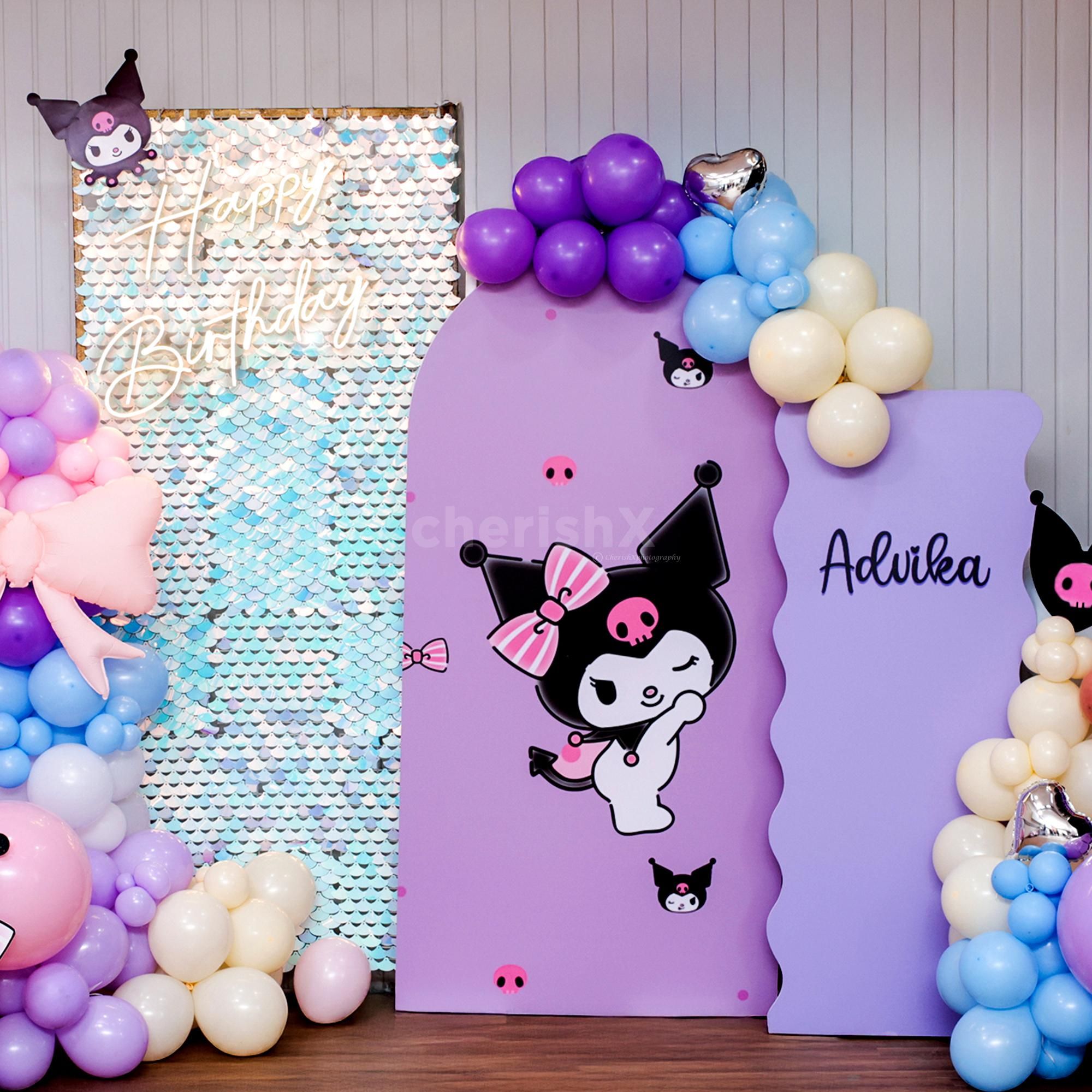 A radiant birthday neon light adds glamour to the setup.