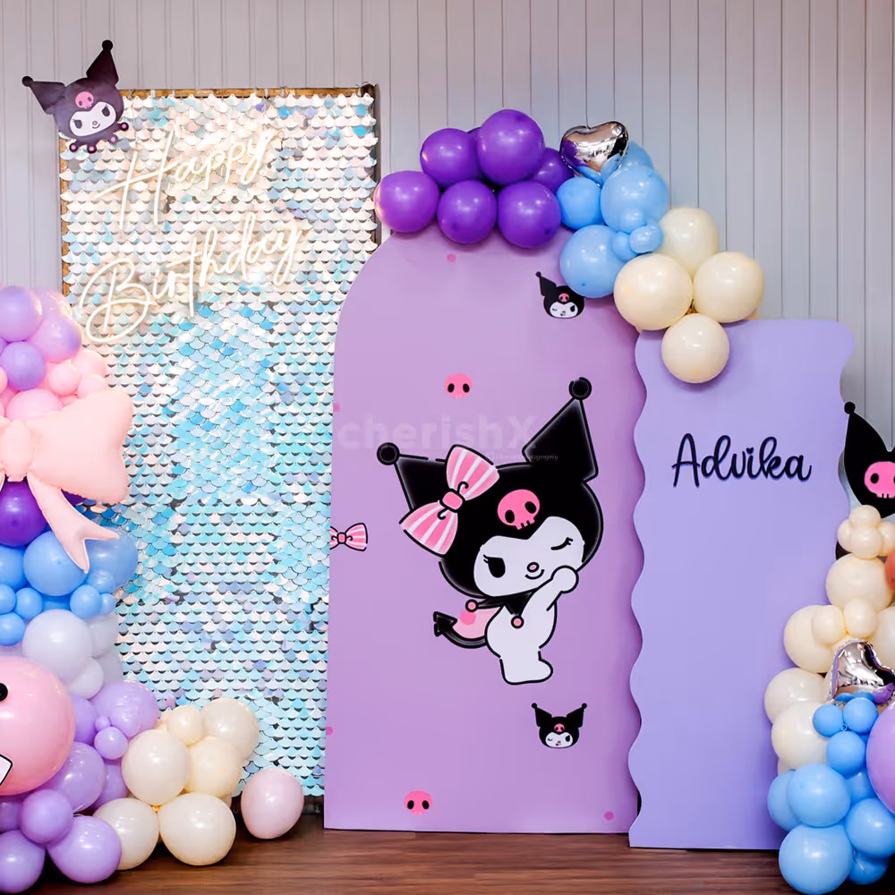 A radiant birthday neon light adds glamour to the setup.