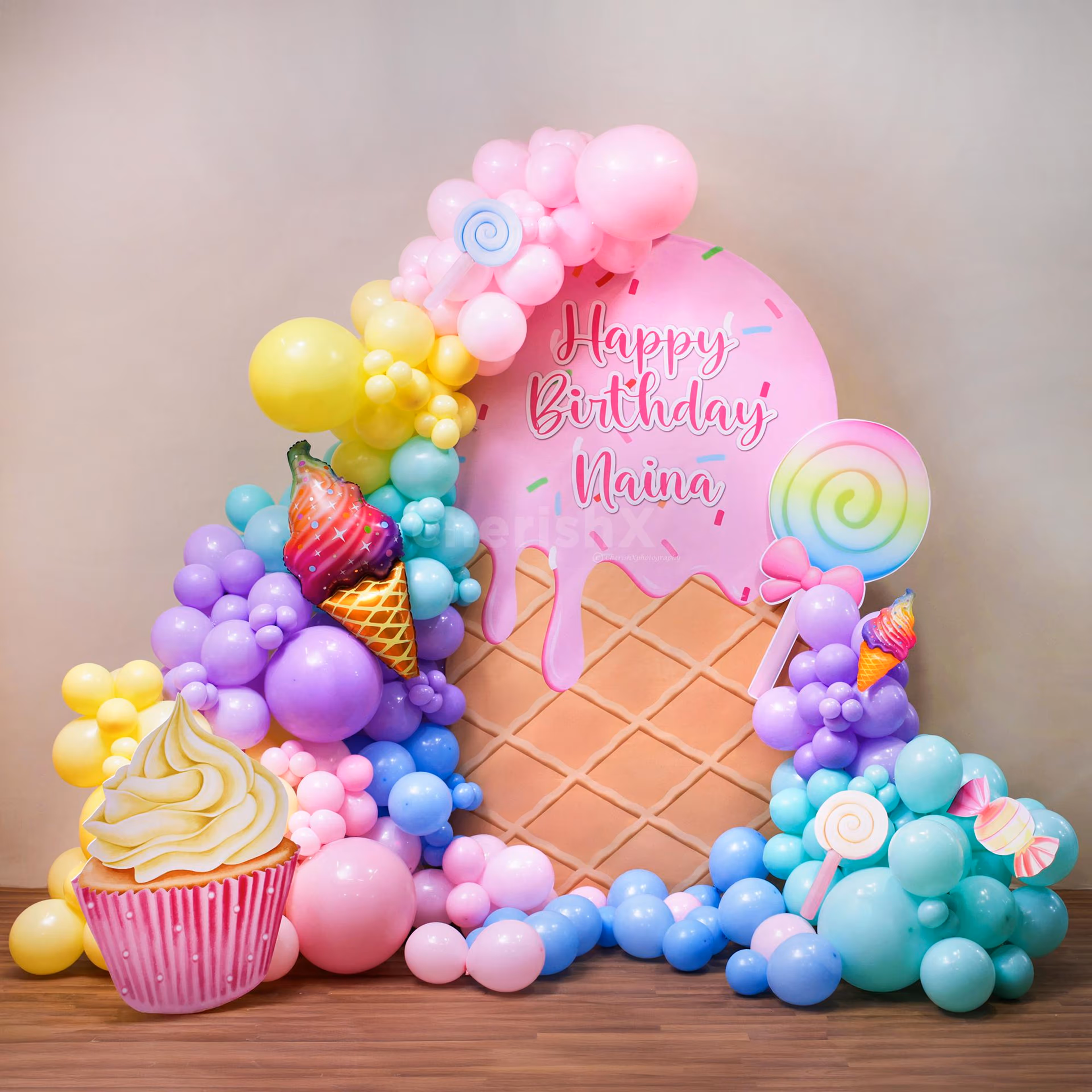 Macaron balloons in different pastel shades create visual delight for b’day