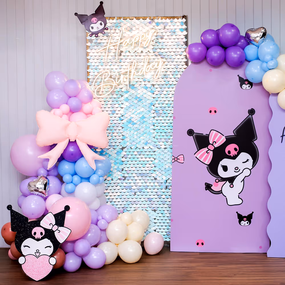 A pastel balloon arch spreads fun colors around the party.