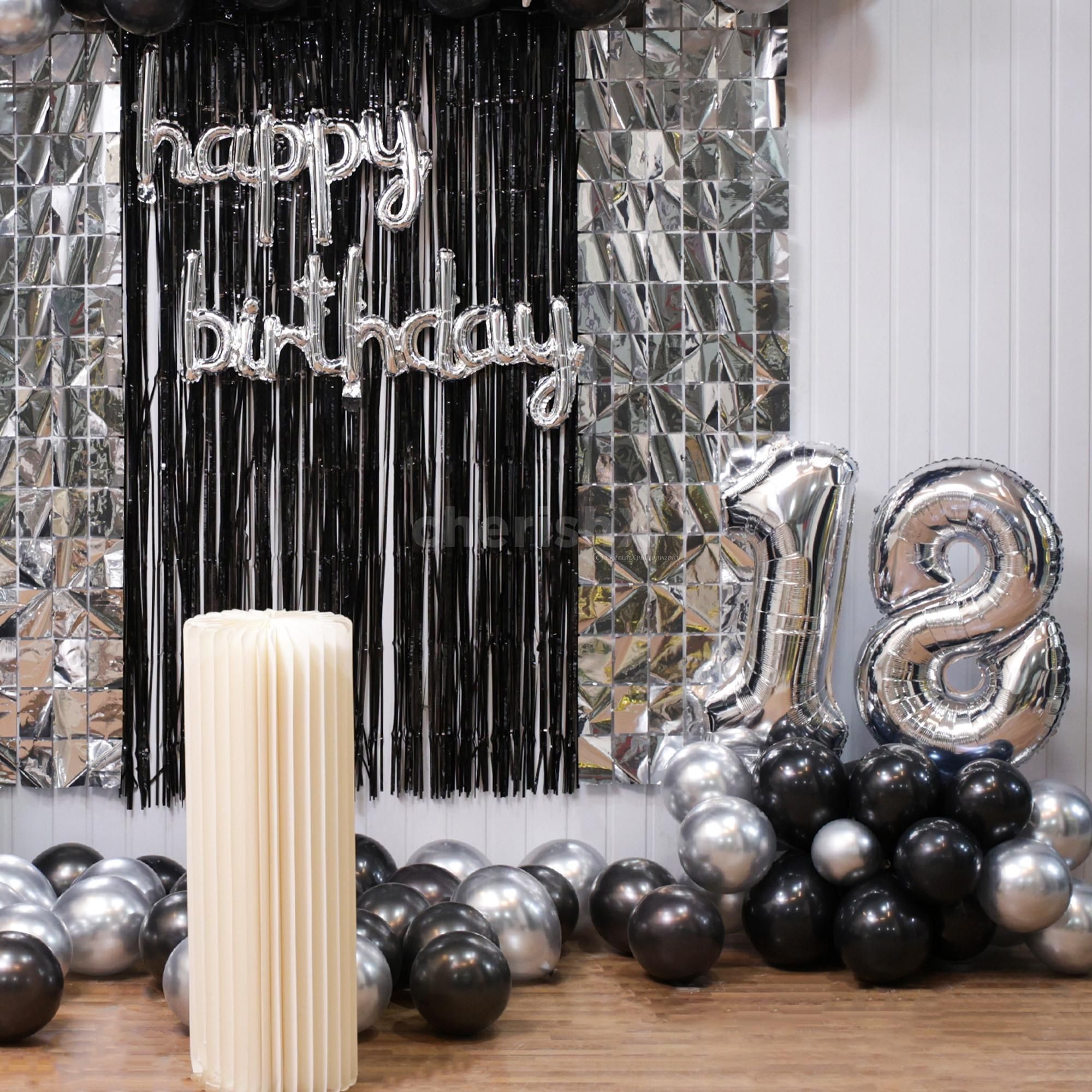 A perfectly eye-pleasing birthday cursive foil balloon on a frill curtain