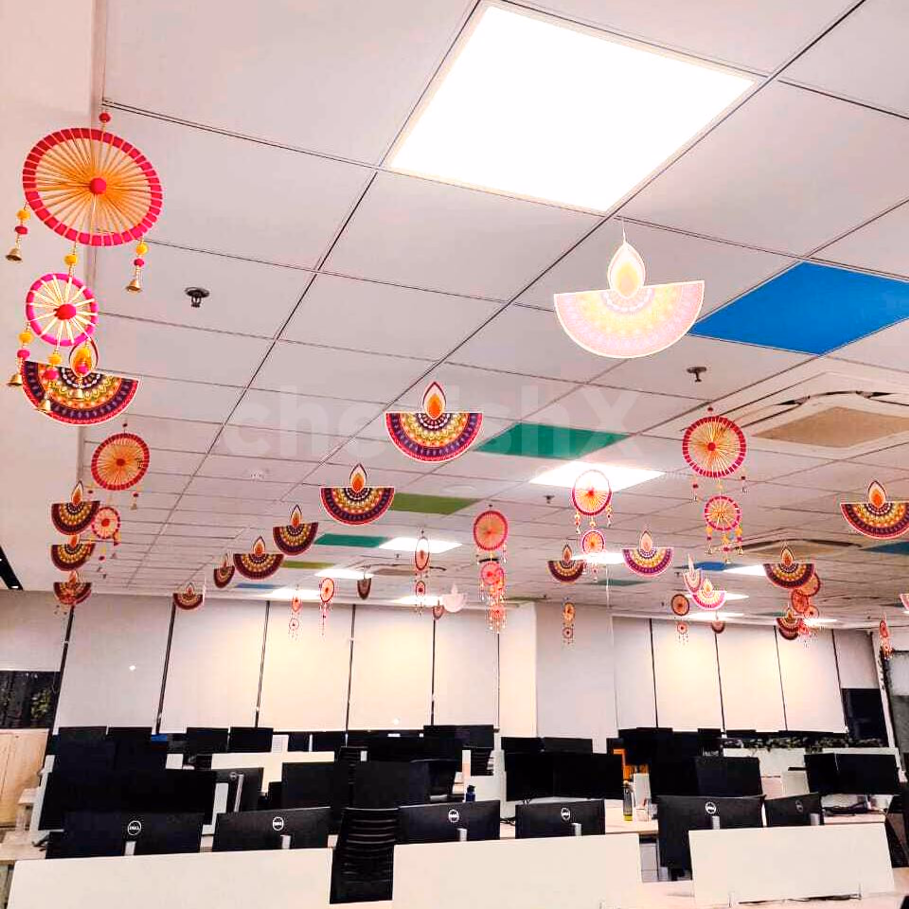 Double-sided diyas cutouts send the glowy vibes with their shimmer decoration