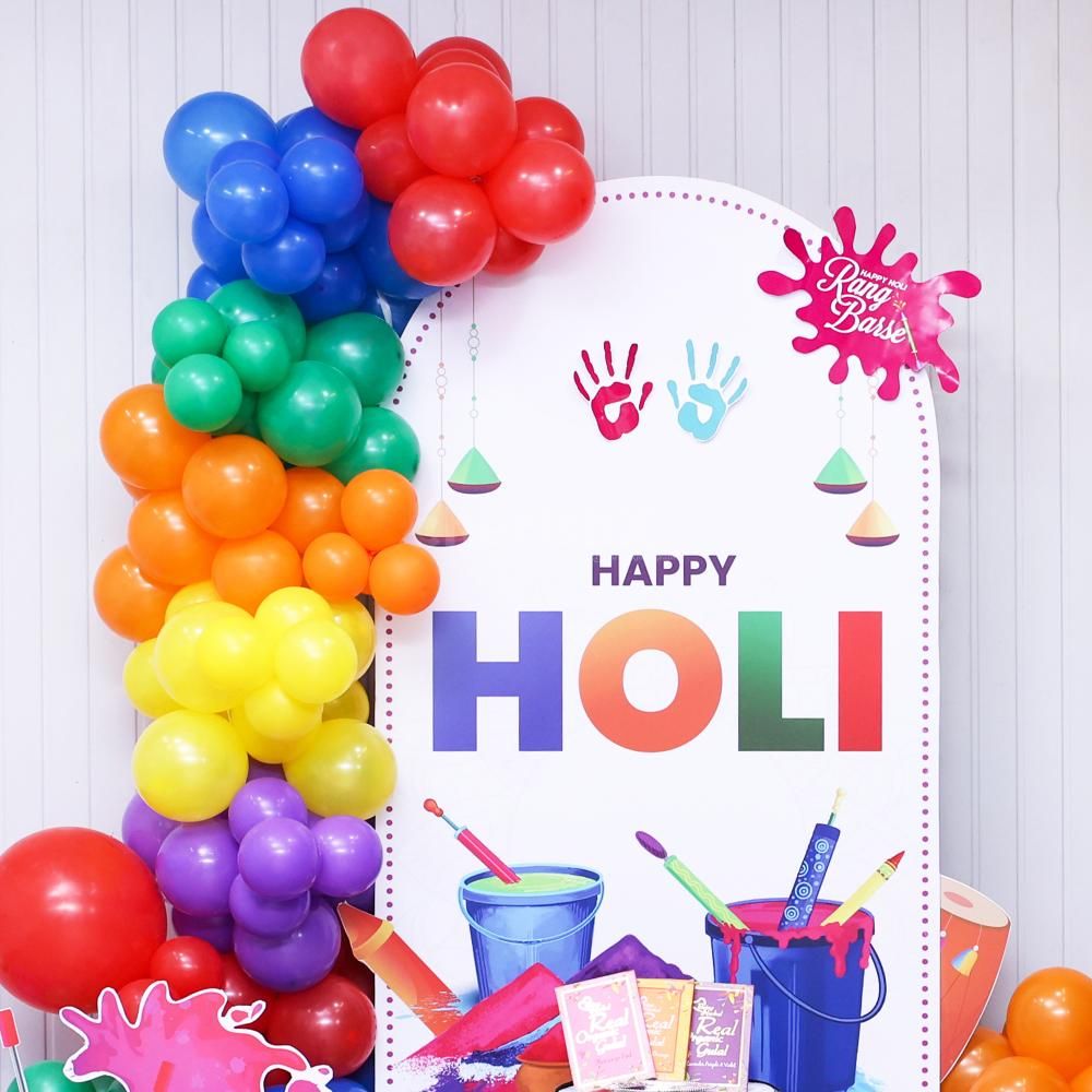 A colorful balloon arch to add festive vibes to your Holi party!