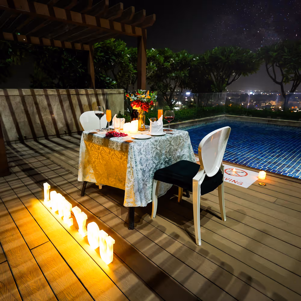 proposal setup near poolside, romantic dining