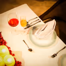 couple wine glasses, romantic dining in delhi ncr