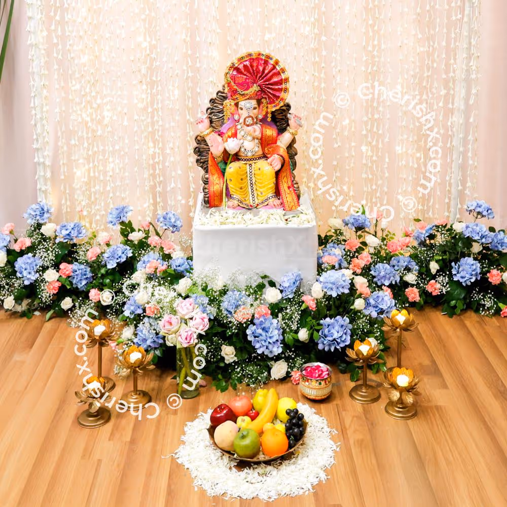 Floodlights and LED lights on lotus shaped candle holders glow up the decor