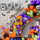 Add colour and creepiness with bats, balloons, and spooky BOO foil.