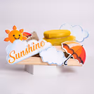 A sunshine-themed birthday hamper filled with warmth and happiness.