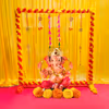 Sturdy PVC frame covered with double color garlands is a perfect backdrop for puja