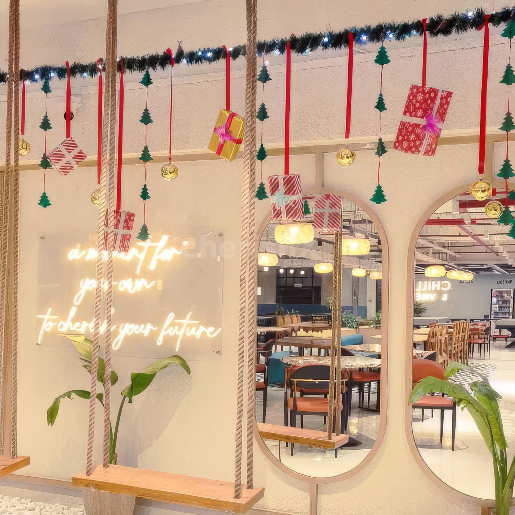 Golden balls shimmer and reflect the fairy light glow, making a dreamy decor