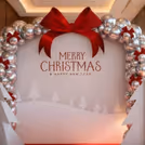 Red big and small bows incorporate traditional Christmas culture in a modern setting
