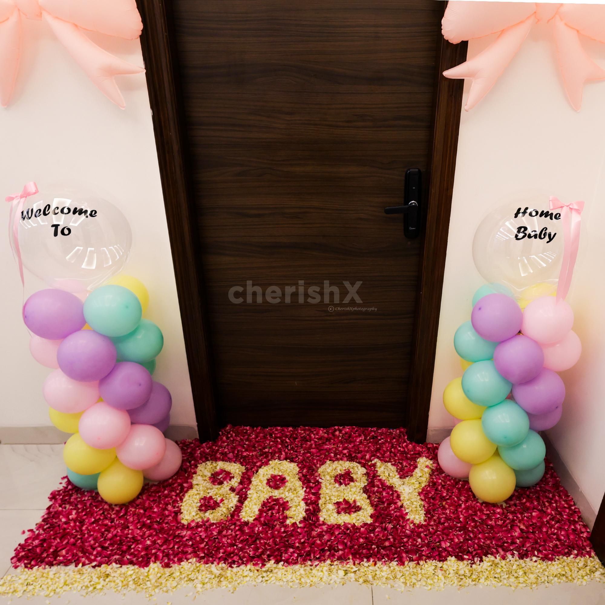 Balloon pillars with bows and bubble accents make for a fun yet sophisticated look.