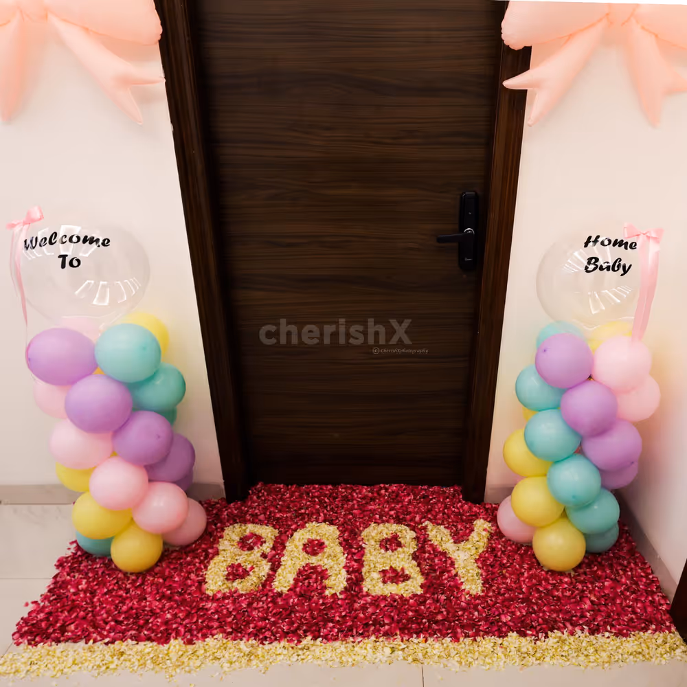 Balloon pillars with bows and bubble accents make for a fun yet sophisticated look.