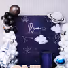 Metallic balloon arch in black, silver, and white celestial harmony.