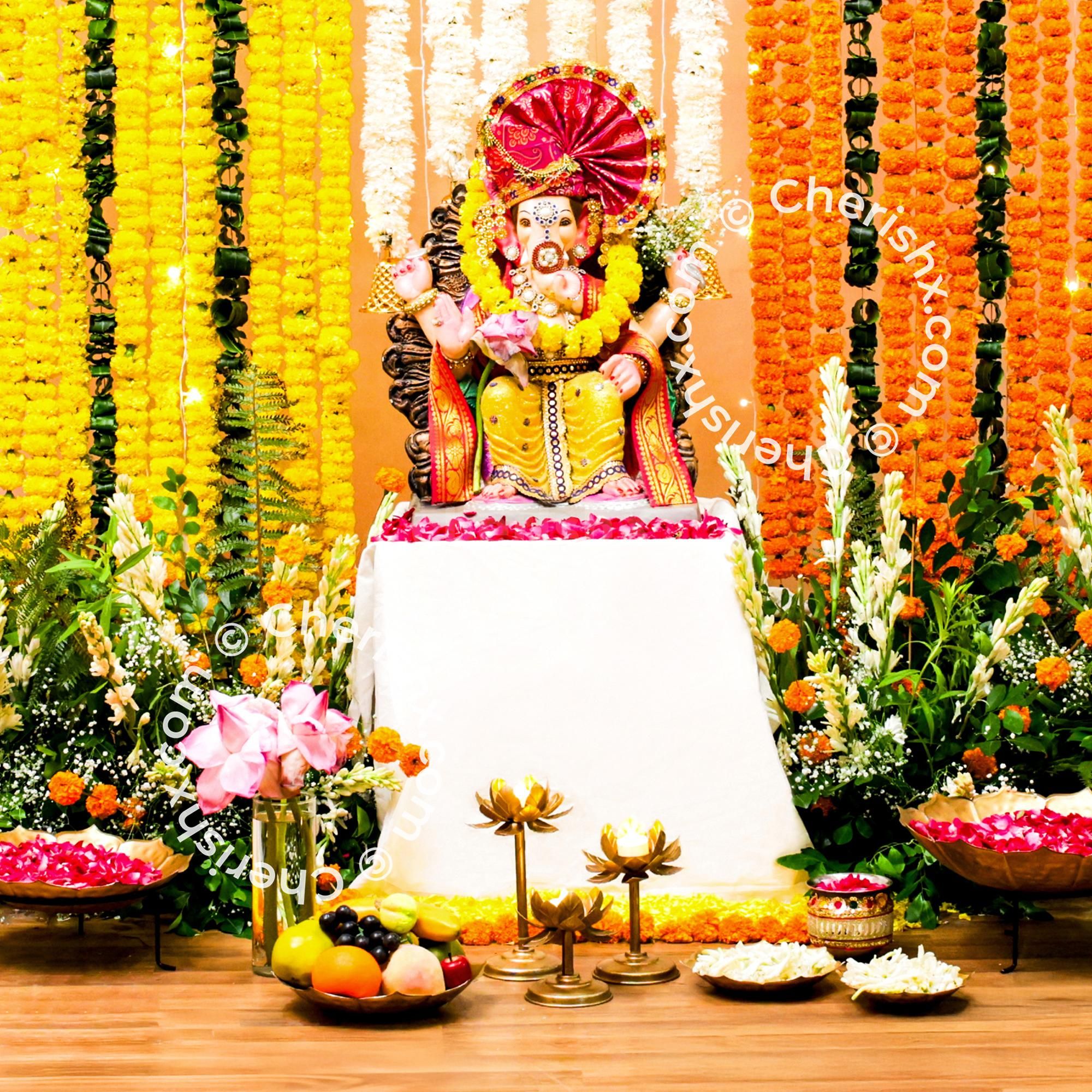 Ganesh Chaturthi Orange and yellow marigold flowers ensure festive serenity remains intact