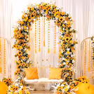 Yellow umbrellas and flowers contribute to a happy mood.