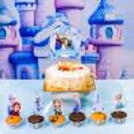 Balloon arch at one side frames the castle backdrop with shining stars