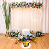 A 6x6ft flex backdrop stand with oversized lotus flowers and lush green leaves