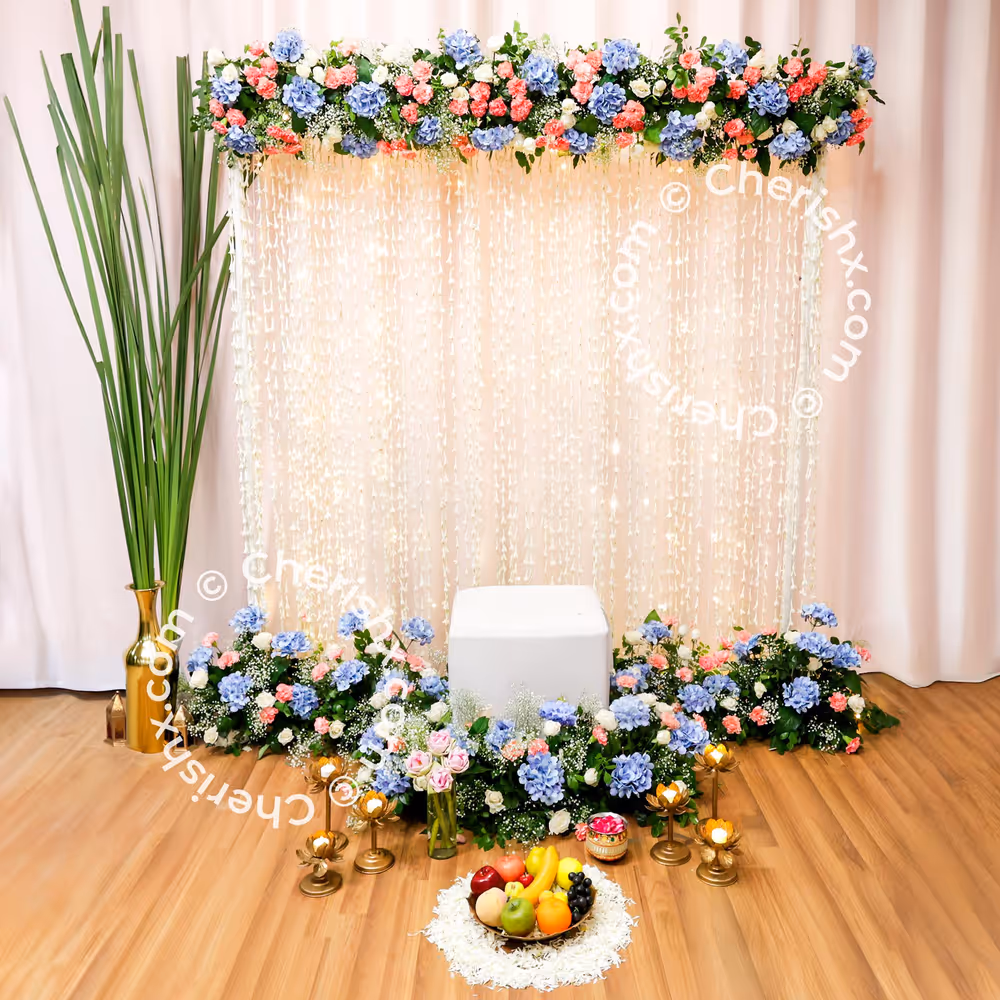 A 6x6ft flex backdrop stand with oversized lotus flowers and lush green leaves