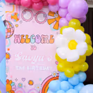 Pink purple and blue macron balloons create a splash.