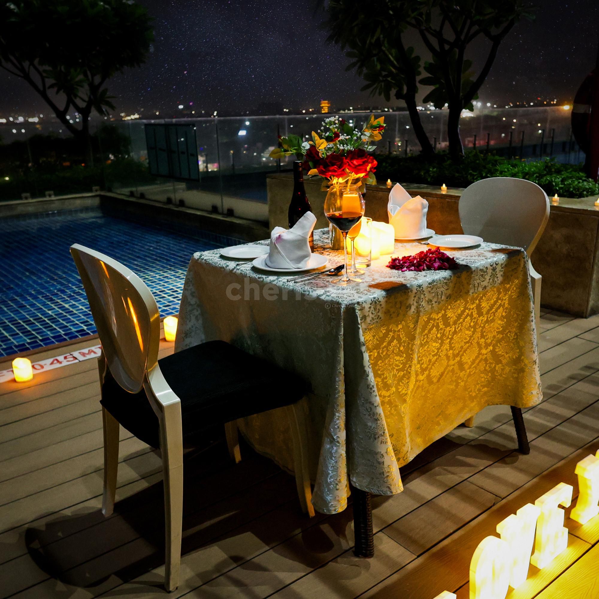 romantic private candlelight dining by the pool