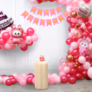 Labubu cutouts and foil balloons add the drama and twist of a modern element