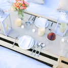 A peach centrepiece amidst floral elegance.
