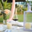 Wooden tables with classy runners waiting for your moments.