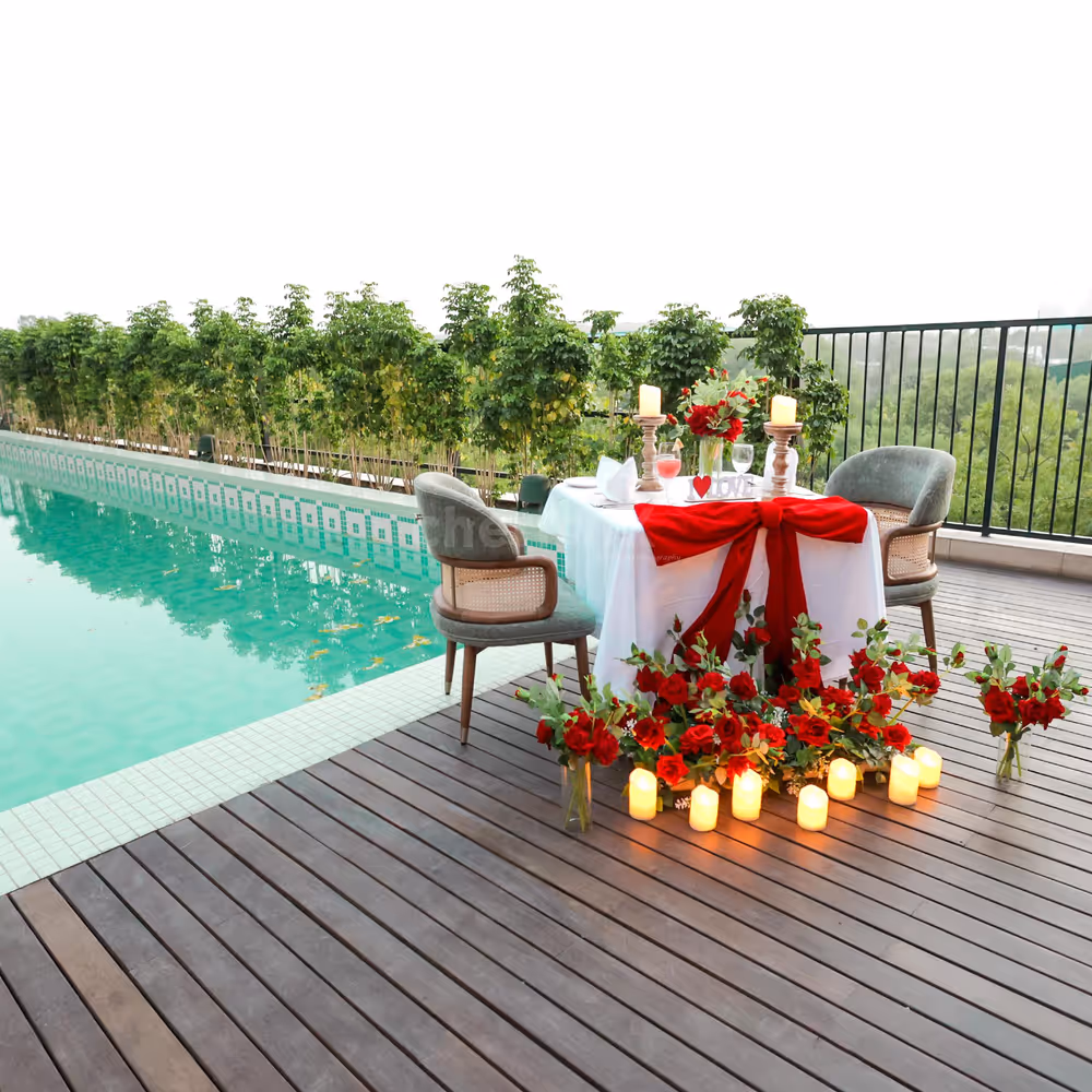A dreamy poolside candlelight setup for an unforgettable date night at Holiday Inn.