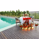 A dreamy poolside candlelight setup for an unforgettable date night at Holiday Inn.