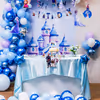 Chrome blue balloons swirl creating the perfect vibe for birthday pics