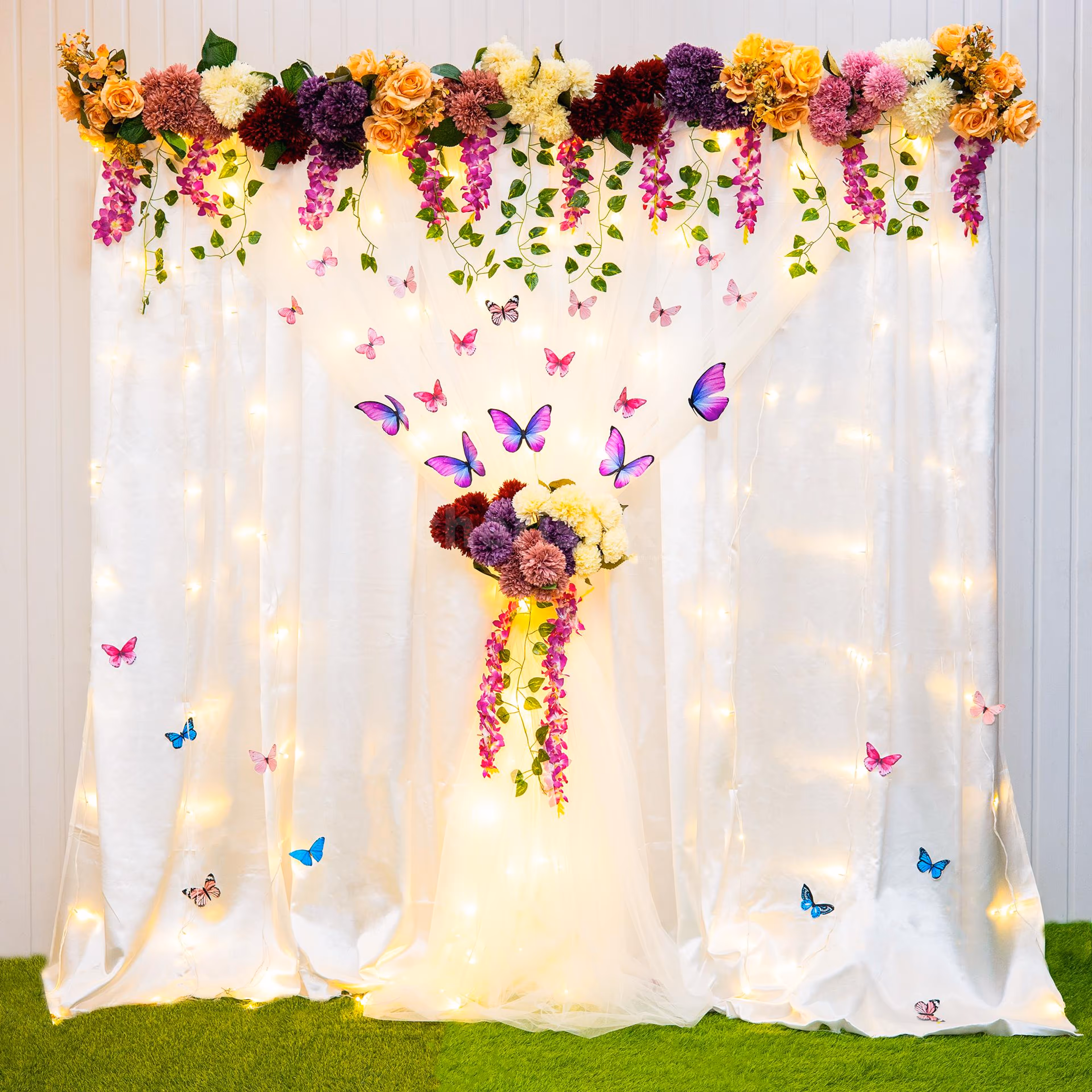 A fantastical white satin backdrop for your roka ceremony
