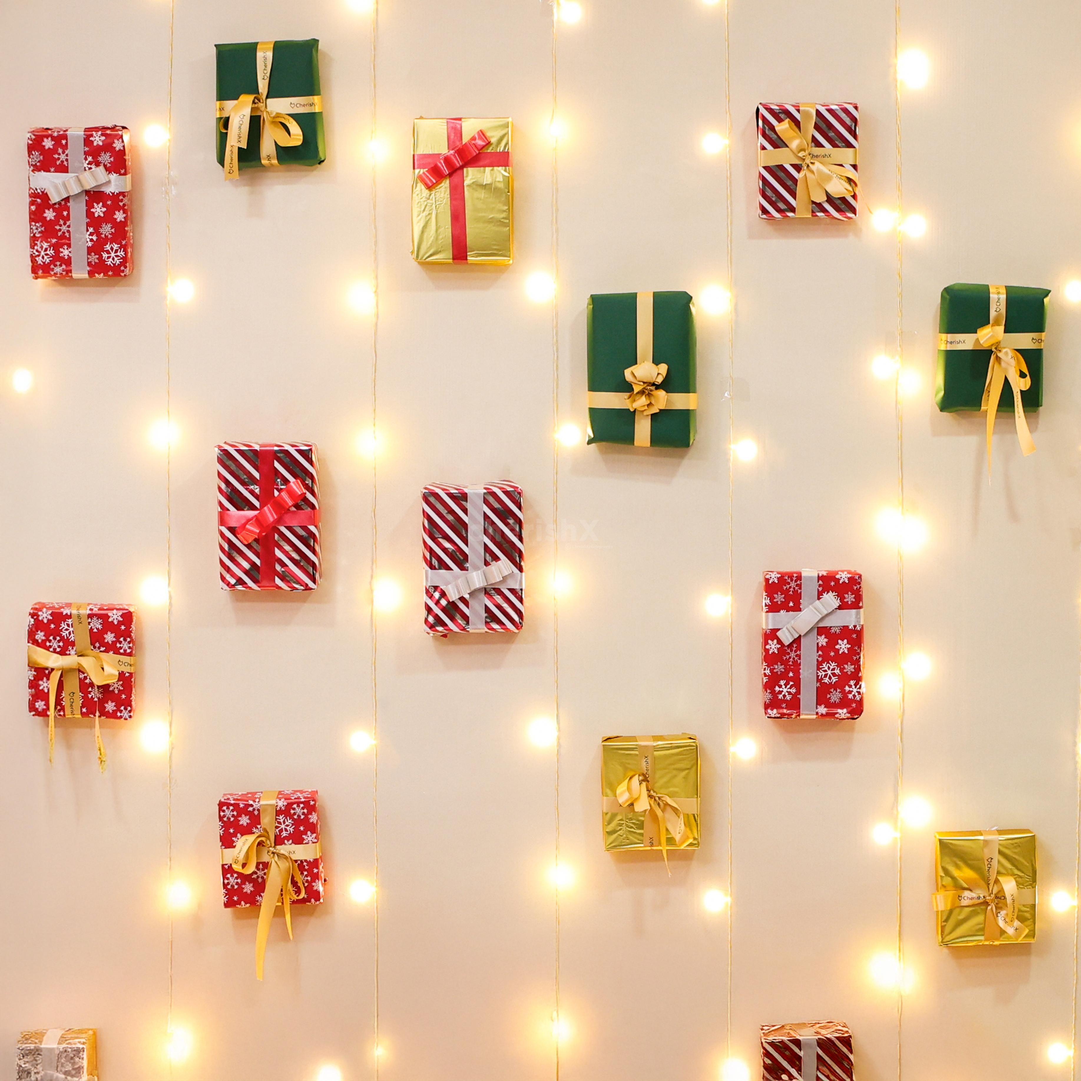 Colourful gift box arrangement on the wall highlights joy and gift expectation during celebration