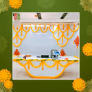 Elegant and artistic pan strings with embellished hangings for a sophisticated office reception decor.