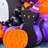 Develop a creepy Halloween theme using colorful balloons and cutouts.