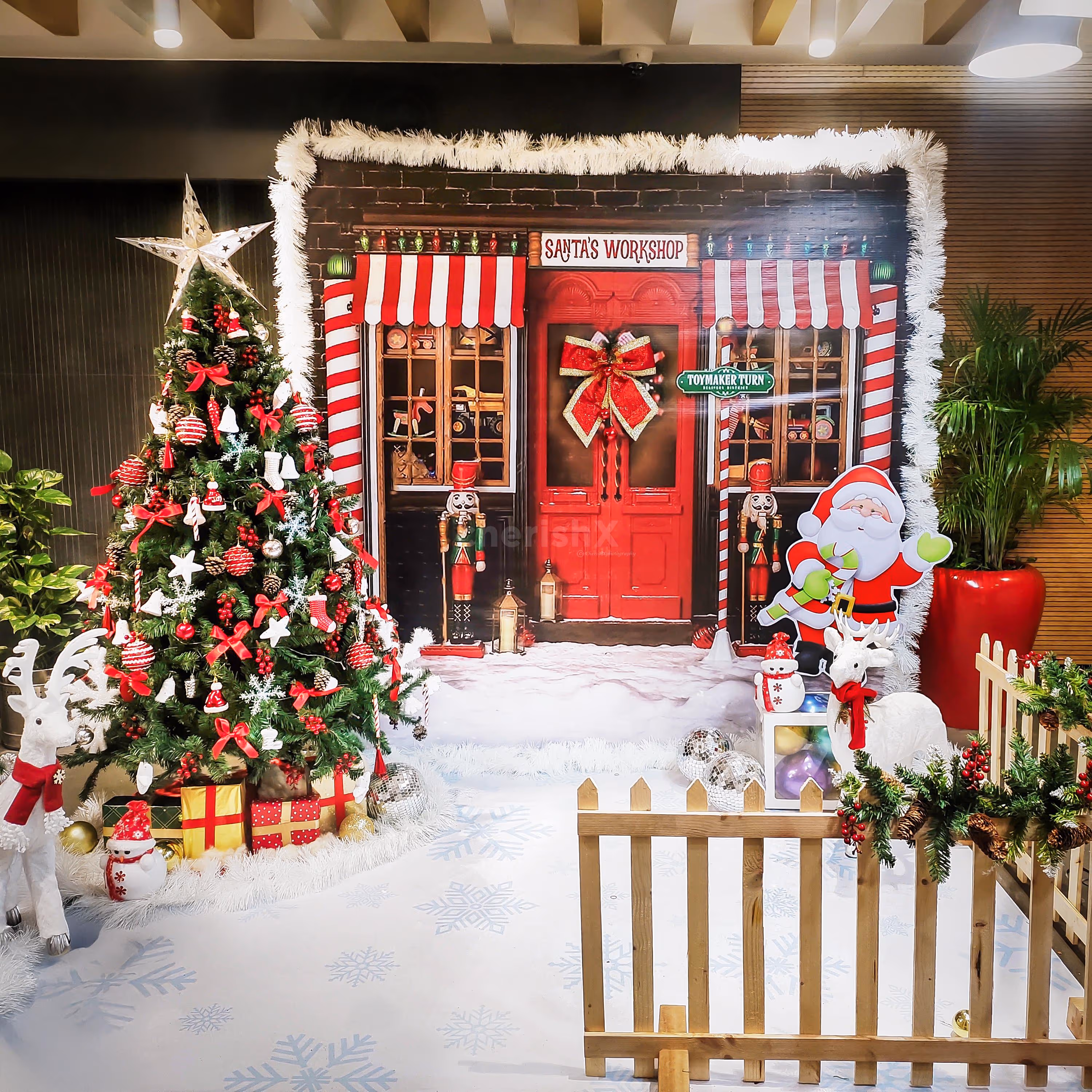 Vintage Santa workshop flex is an ideal photo backdrop.